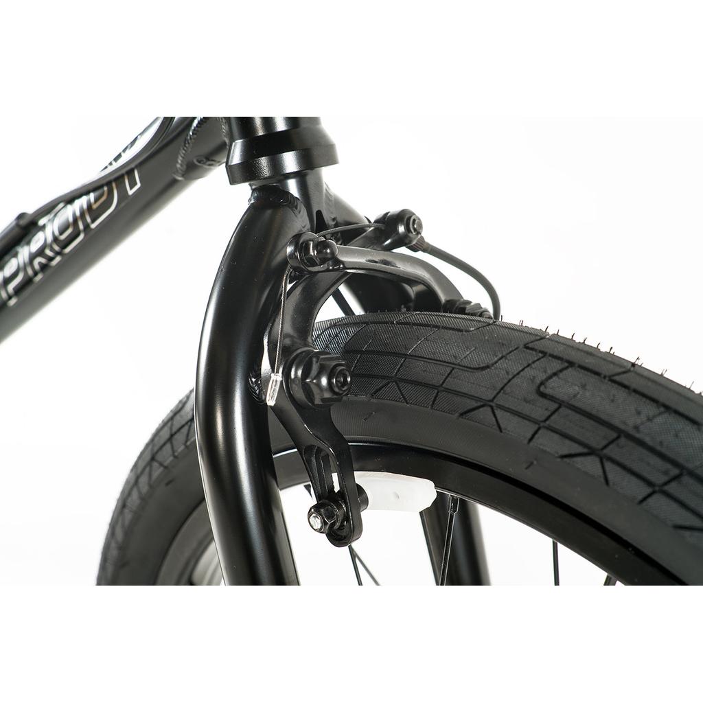 Close-up of a black BMX front wheel with a caliper brake, featured on the limited edition Colony Prody Pro 20 Inch Bike, set against a white background.