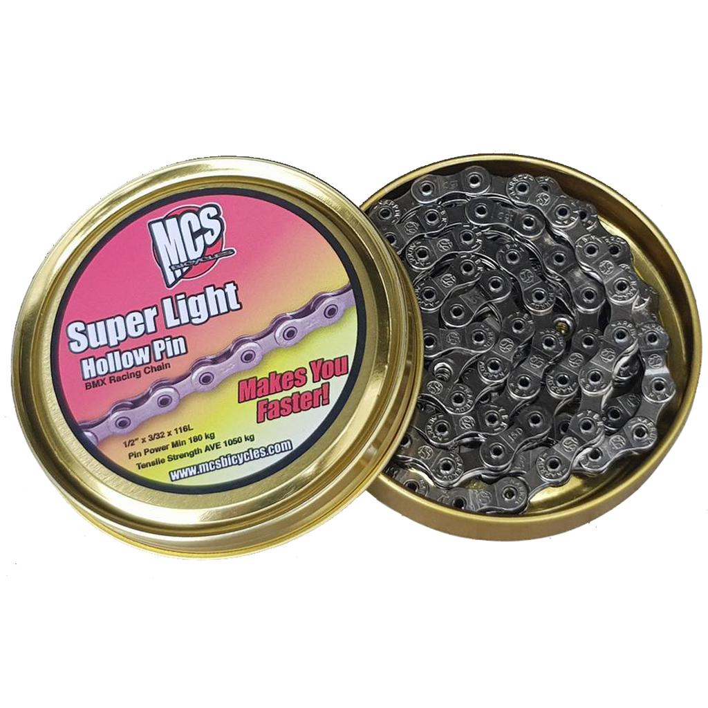 An open tin displays the MCS Superlight Chain (1/2 x 3/32 Inch), a lightweight bike chain for BMX racing, with the product label visible on the lid.