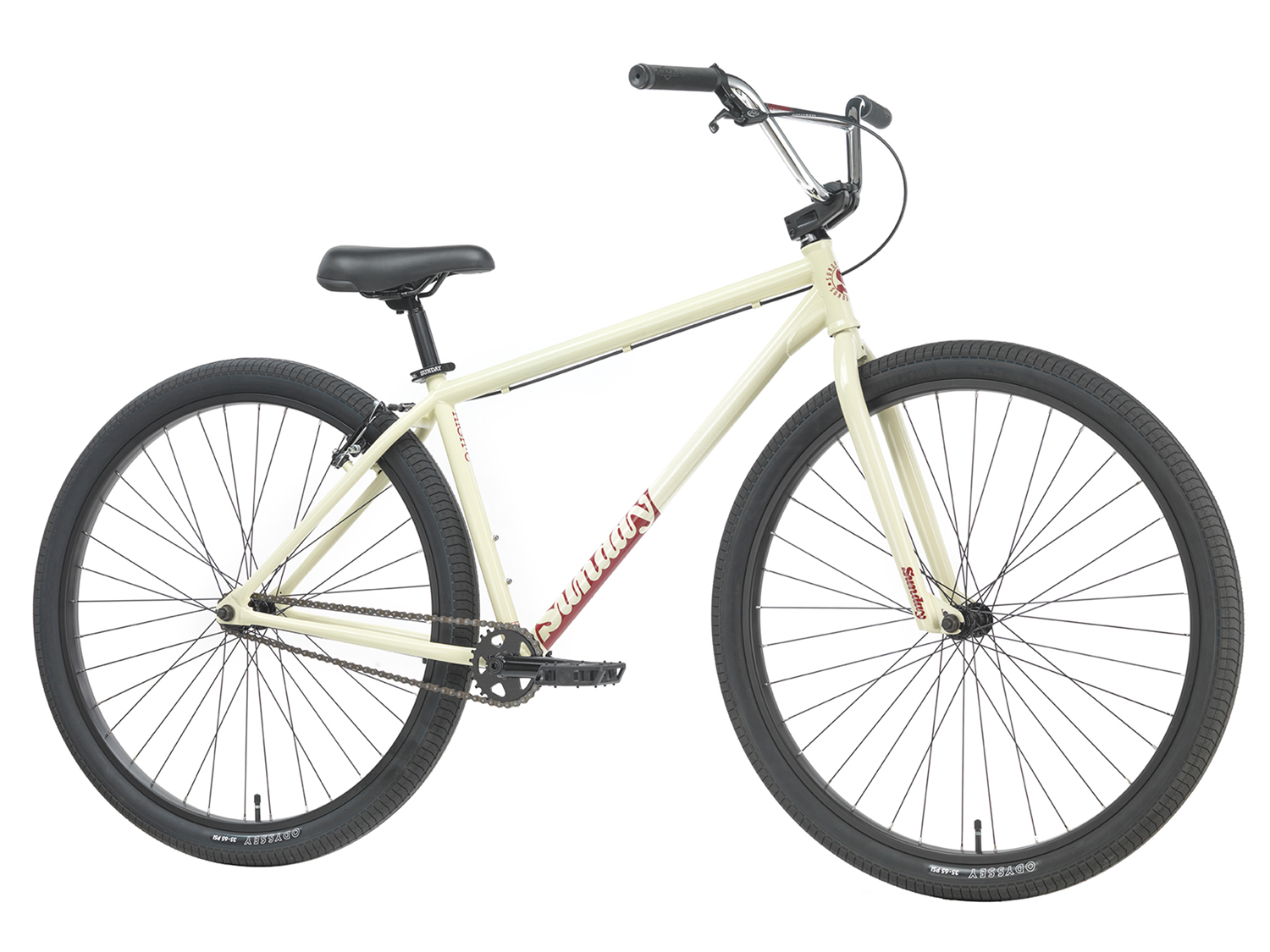 A cream-colored Sunday High C Bike (2026) with a 29" full chromoly frame, black tires, a black seat, and upright handlebars is shown from the side against a white background.