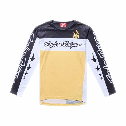 The TLD 26.1 Sprint Pro Jersey (Youth) / Yo Moto Butter features "Troy Lee Designs" text, black shoulders, a yellow body, white/black sleeves with star graphics, and a race fit for standout performance and style.