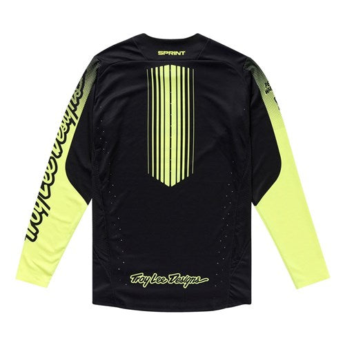 The TLD 25.2 Sprint Jersey / Segment Black features black and neon yellow with vertical back stripes, "Sprint" at the neck, plus "Troy Lee Designs" at the bottom and left sleeve—a bold race jersey made for performance.