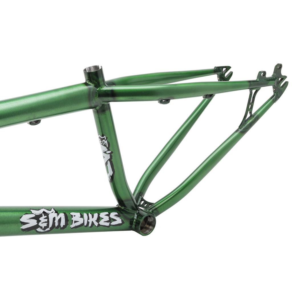 A close-up of the S&M Big Jumper 26 Inch Dirt Jumper Frame in metallic green, highlighting the bottom bracket, chainstays, seat tube, and rear dropouts.