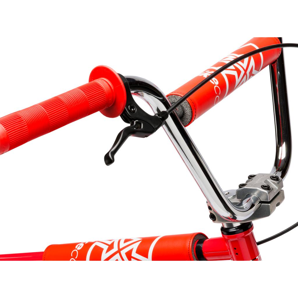 Close-up of the Fit Bike Co Series 22 Inch Bike's red and chrome handlebars featuring padded grips, brake lever, protective foam pads, and detailed brand logos.