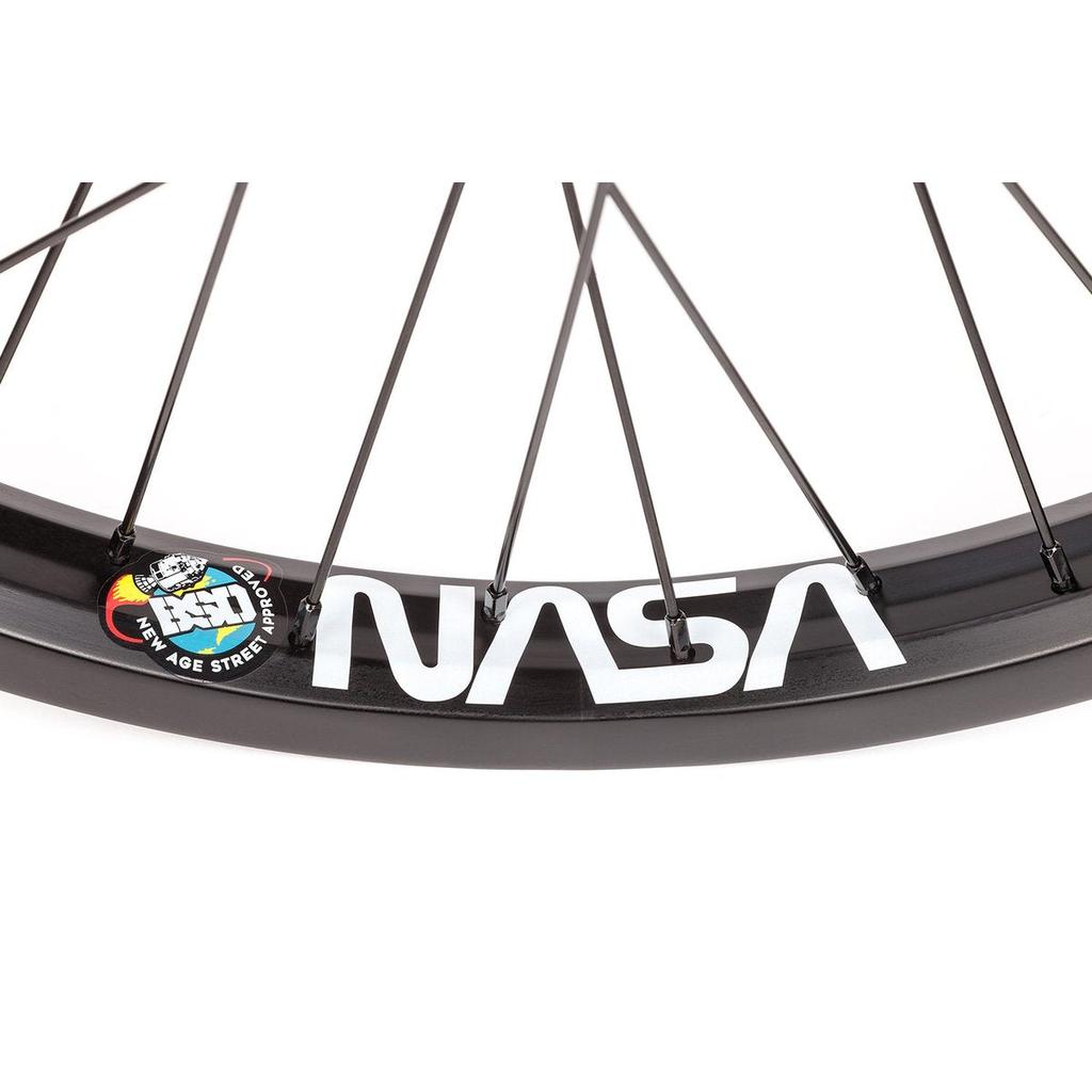 Close-up of the BSD Mind (NASA/West Coaster) Rear Wheel—black BMX rim with white "NASA" text, colorful “BSD New Age Street Approved” sticker, and BSD West Coaster hub for top freecoaster performance.