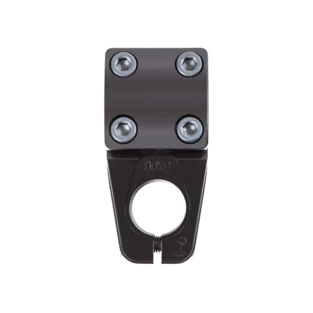 The Odyssey Boyd Stem (Boyd Hilder Signature) is a black BMX stem featuring four hex bolts on the front clamp and a circular handlebar opening for dependable performance.