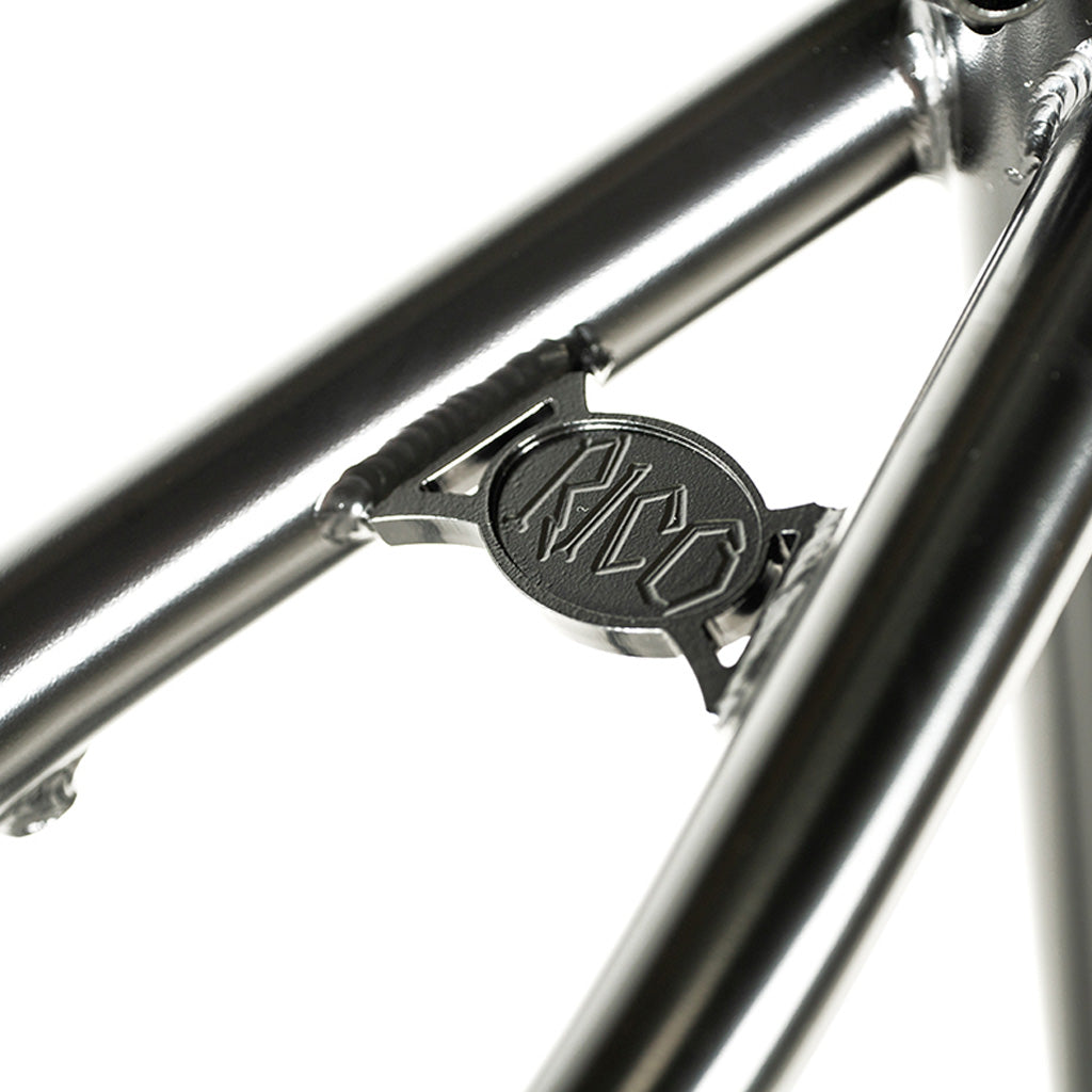 A close up of the Colony Rico 'Lite' Frame with a logo on it, featuring Paterico Fallico, the technical wizard.