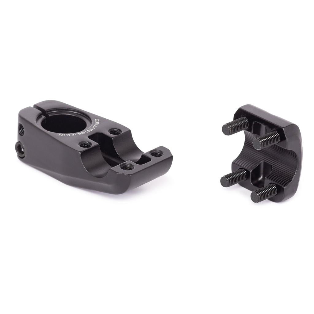 The Eclat Onyx OS Stem (25.4mm Clamp) in black metal is displayed in two pieces, highlighting its oversize four-bolt clamping system designed for superior strength and reliability.