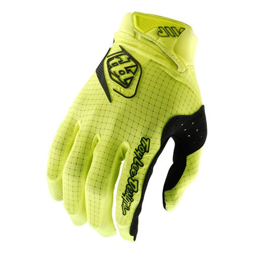 The TLD 26.1 Air Gloves (Youth) in Flo Yellow feature a black grid pattern, logo, and "Troy Lee Designs" text for an ergonomic fit and comfort on every ride.