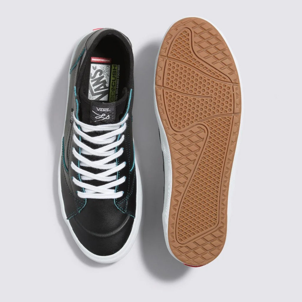 A pair of sustainable Vans The Lizzie Wearaway High Top Shoes - Wearaway Black/Blue, perfect for skateboarders, with white soles.