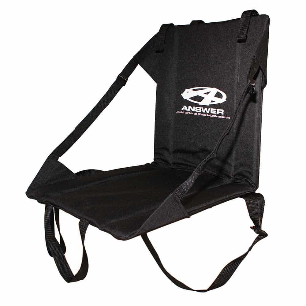 The Answer Stadium Seat is a black portable seat with back support, adjustable straps, and the "Answer" logo on the backrest. Its padded base and arm straps offer comfort and convenience at BMX races or any game.