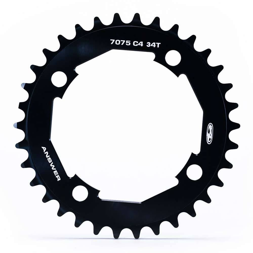 Black BMX racing bicycle Answer Typhoon C4 4 Bolt Chainring with 34 teeth, labeled "7075 aluminium 34t" and "Answer Typhoon" on a white background.