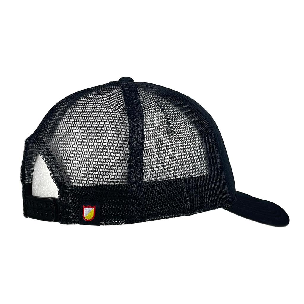 The S&M Rambler Sharpie Shield Cap is a black mesh-back hat with an adjustable snapback closure and a small shield emblem near the strap, offering the classic Trail Dawgs style.