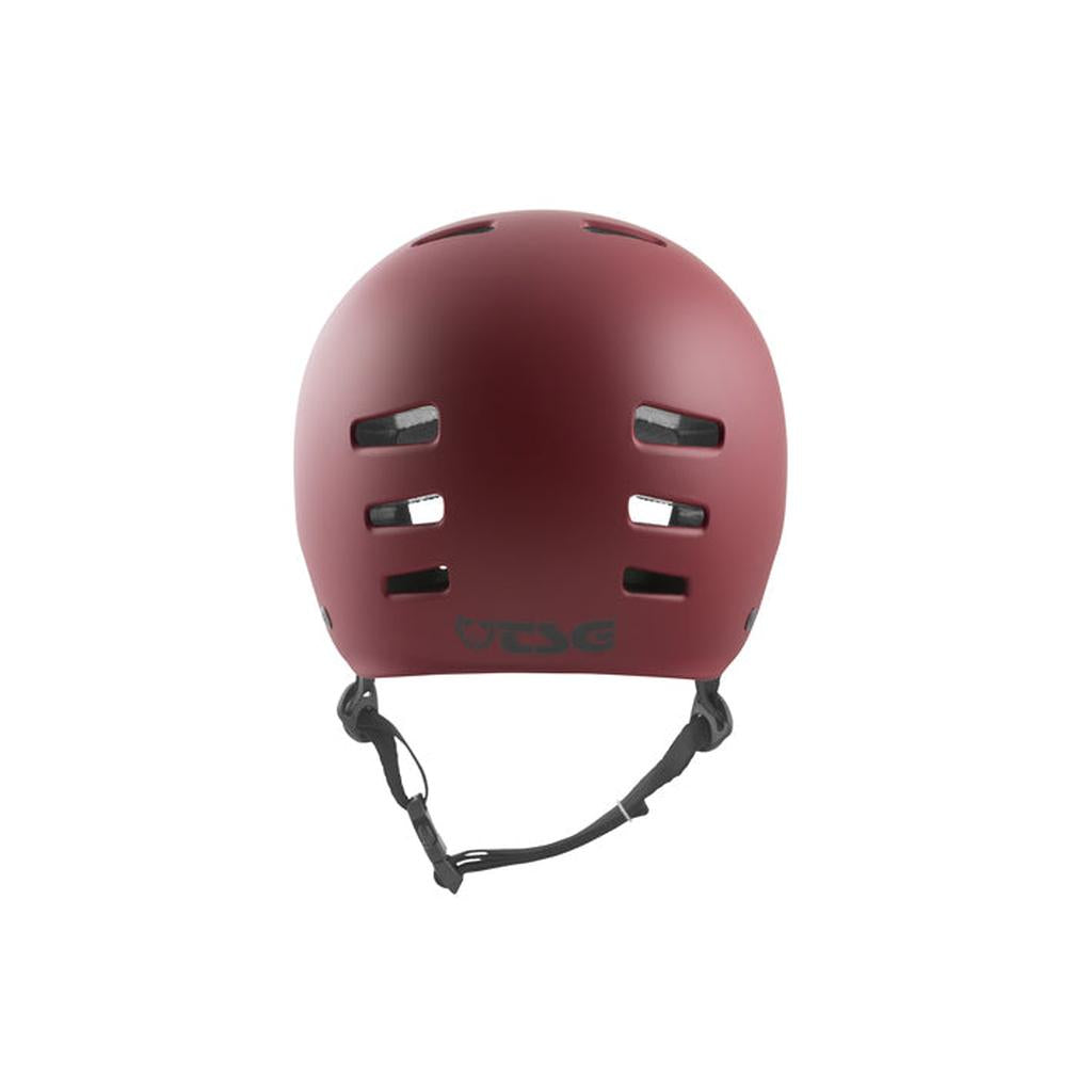 A TSG Evolution Helmet in Satin Oxblood is shown from the front, featuring ventilation slots, hardshell construction, and an adjustable chin strap.