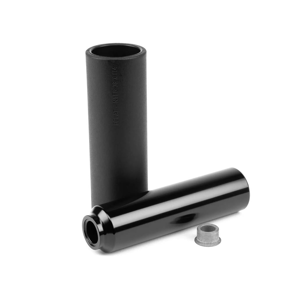 Two black Eclat Venom XLT Pegs (4.8 Inch), each with a durable nylon-fiberglass sleeve and one 7075-T6 alloy insert, are shown standing upright and lying down on a white background.
