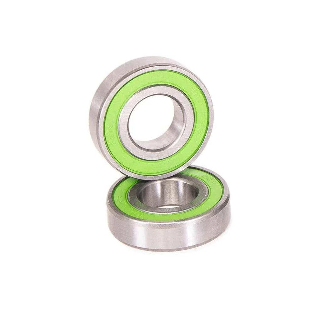 Two Salt Rookie Mid Bottom Bracket Bearings Only, each with green seals—one standing upright on top of another lying flat, set against a white background.