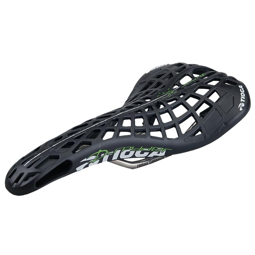 The Tioga D-Spyder Chromoly Railed Seat is a black bicycle saddle featuring a lattice, open-web design with green accents. The “Tioga” and “Spyder” logos are visible on the side, and its lightweight build includes durable chromoly rail construction for both style and strength.