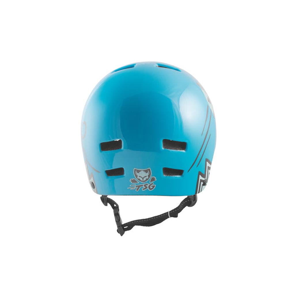 The TSG Nipper Maxi Helmet / Fly Like A Bird is shown from the back in blue, featuring ventilation slots, a chin strap for a secure fit, lightweight design, and the TSG logo at the bottom.