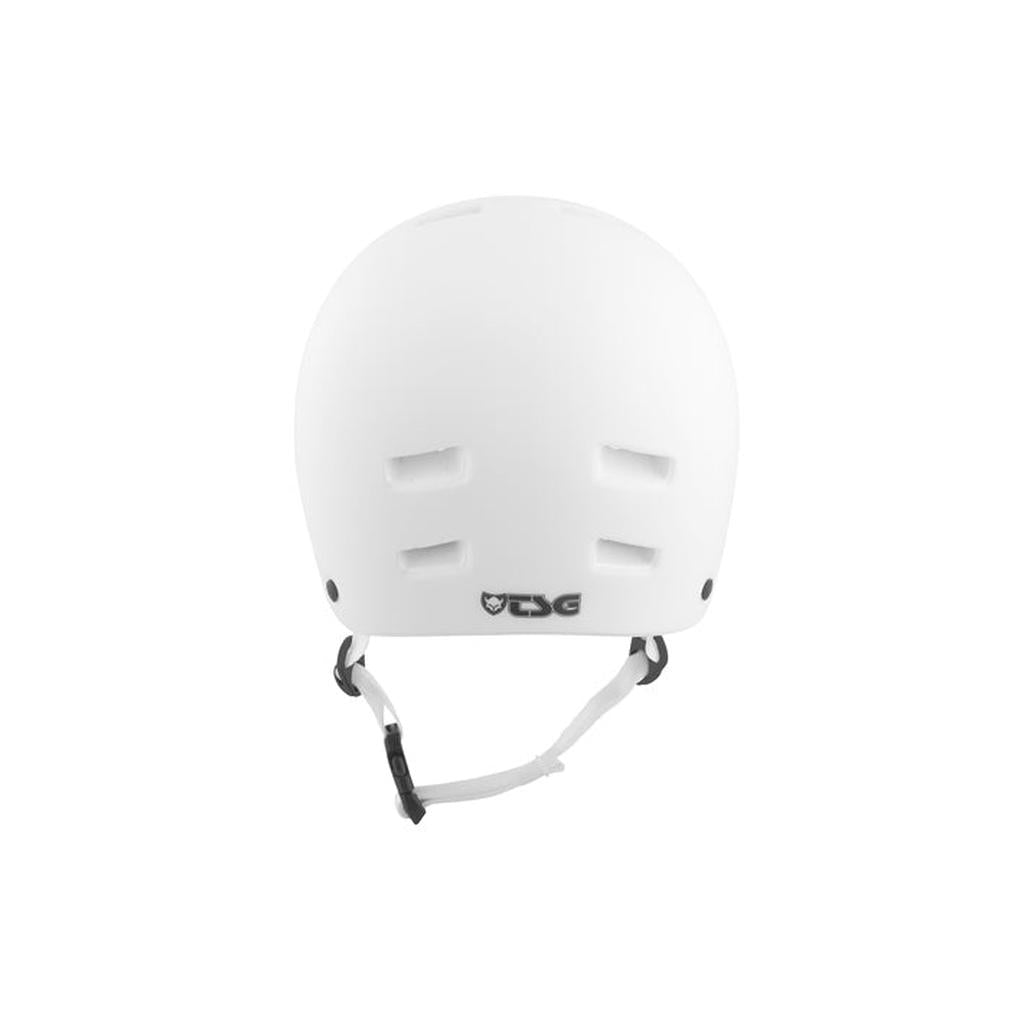 Rear view of the TSG Nipper Maxi Helmet / Satin White, showcasing four ventilation slits and an adjustable chin strap.