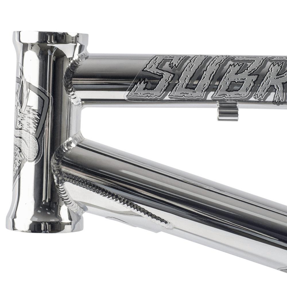 A close-up of the metallic Chromoly frame highlights detailed welds and engraved “SUBR” text on the top tube, showcasing the craftsmanship of the Subrosa Speedwolf V2 Race Frame.