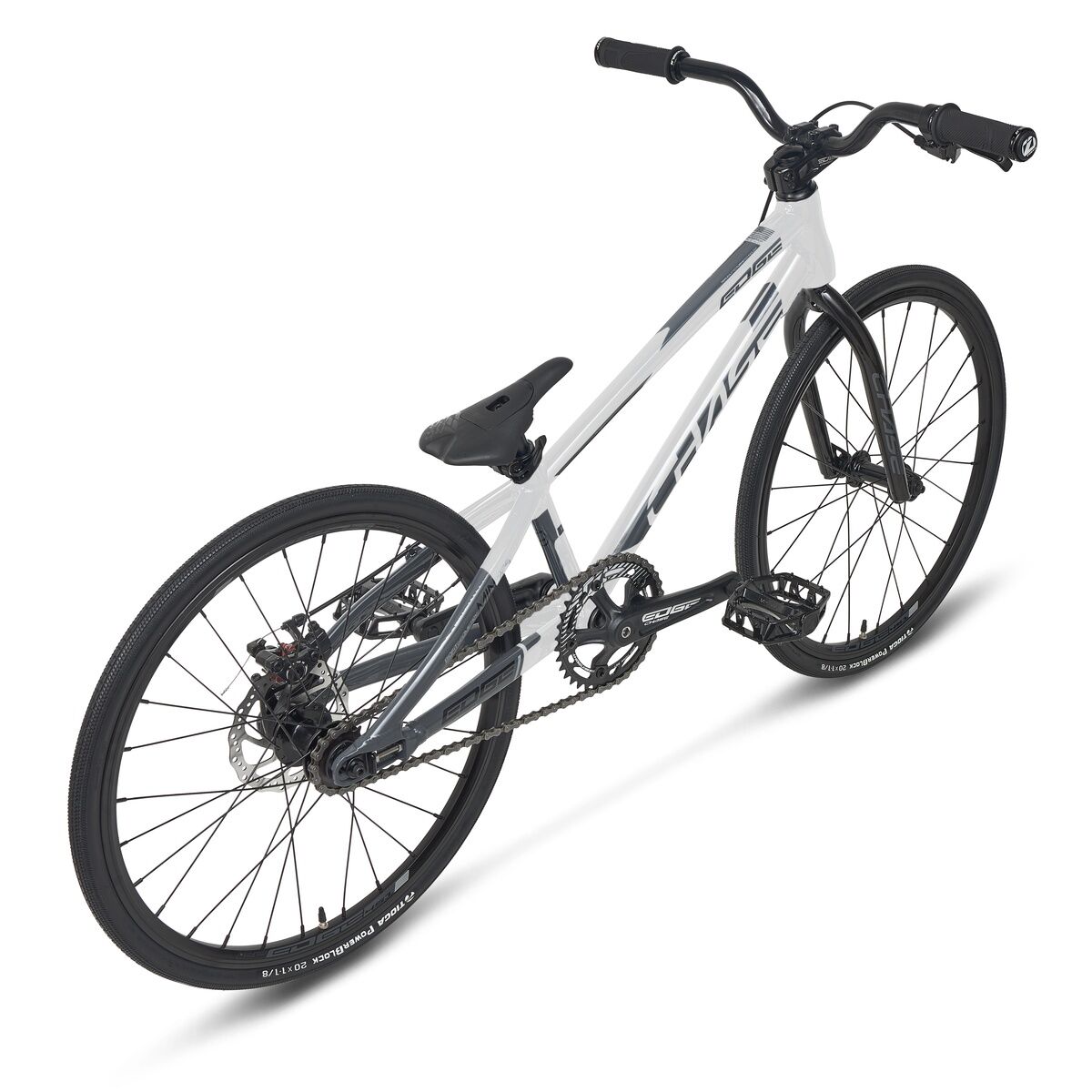 The Chase Edge Mini Bike (2026) is a black and white BMX race bike featuring a lightweight 6061 aluminum frame, flat handlebars, and Shimano hydraulic disc brakes, shown from the rear left side.