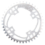 The Elevn Flow 4 Bolt 104 Chainring is a silver CNC race chainring with multiple cutouts and outer teeth, designed for bike cranksets with 104mm BCD compatibility.