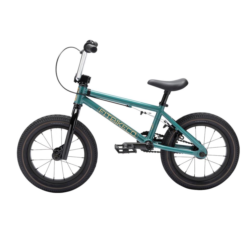 The Fit Bike Co Misfit 14 Inch Bike is a teal BMX with black handlebars, seat, and tires, displayed in profile on a white background—ideal for young riders who want a stylish youth BMX.