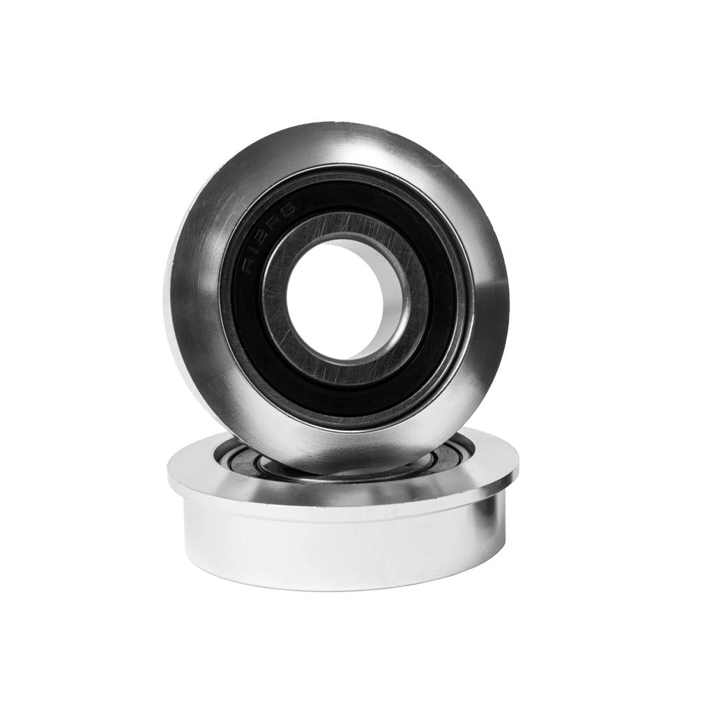 The Odyssey USA Bottom Bracket is shown with two metal ball bearings—one upright and one flat—designed for American BB frames, isolated on a white background.