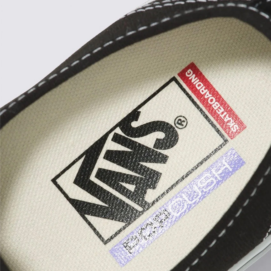 A close up of a Vans Pro Skate Classics Authentic - Black/White shoe from the Skate Pro Series.