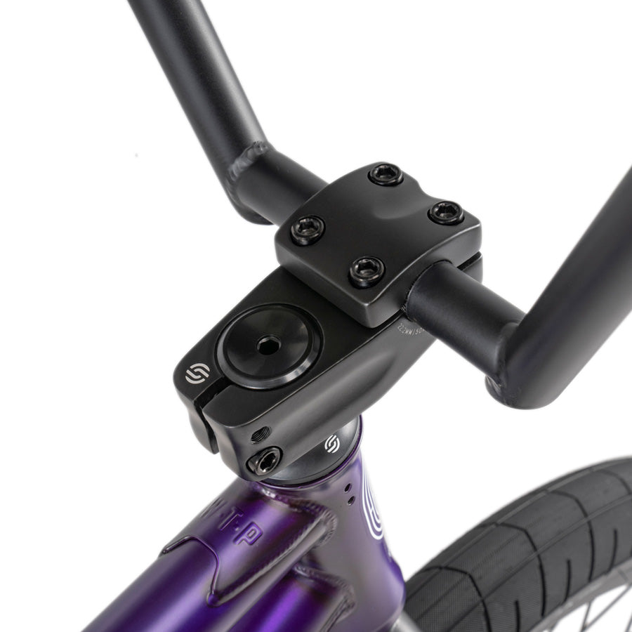 The handlebar of a Wethepeople Reason 20 Inch BMX Bike, a favored by urban warriors.