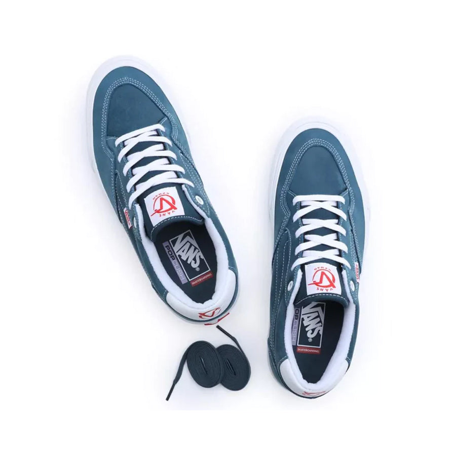 A pair of Vans Rowan Leather Shoes - Blue with a white shoelace.