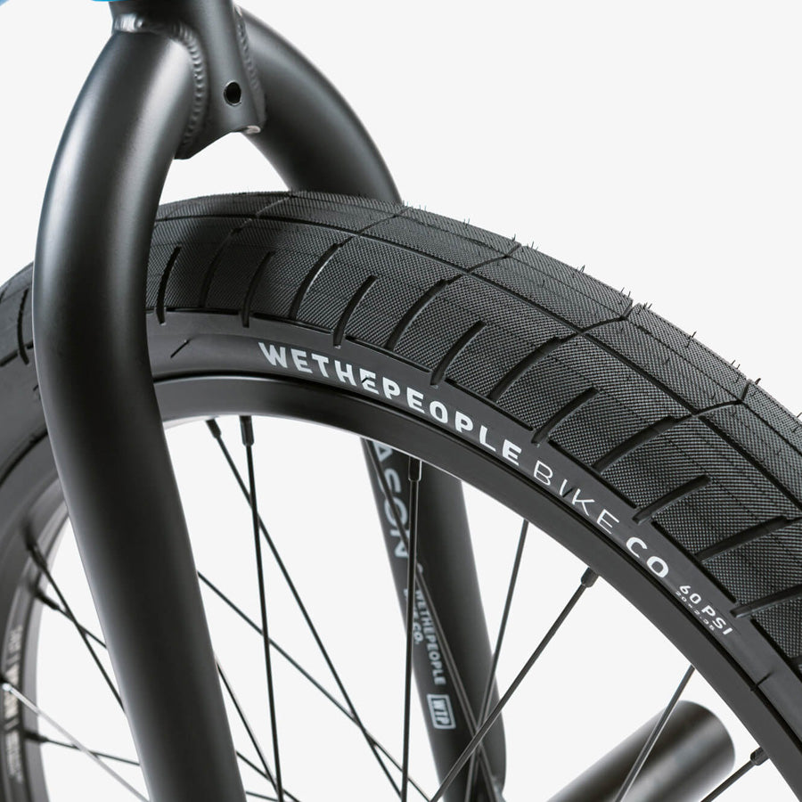 A close up of a Wethepeople Reason 20 Inch BMX Bike tire on a white background.