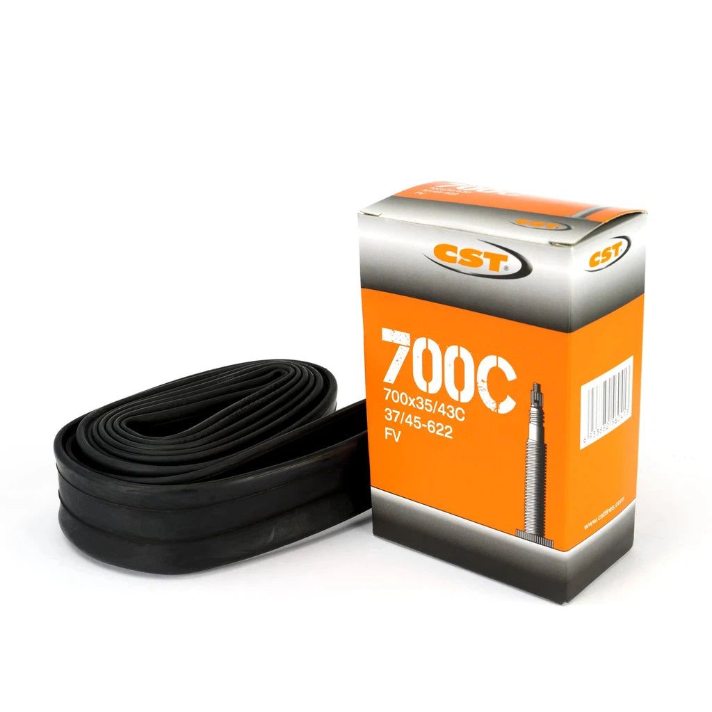 A CST 700c Tube is shown next to its box, which features orange and black colors. The box displays size 700C (37/45-622) and indicates a Presta Valve, making it ideal for those looking for reliable 700c tubes.