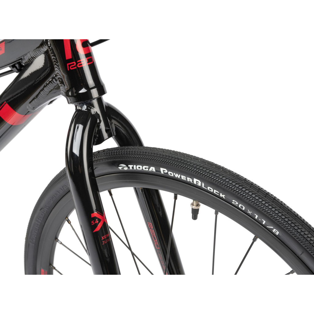 A black and red Radio Xenon Junior Bike with a red handlebar and disc brake ready.