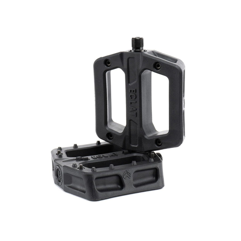 A pair of Juggernaut Pedals on a white background, perfect for grinding.