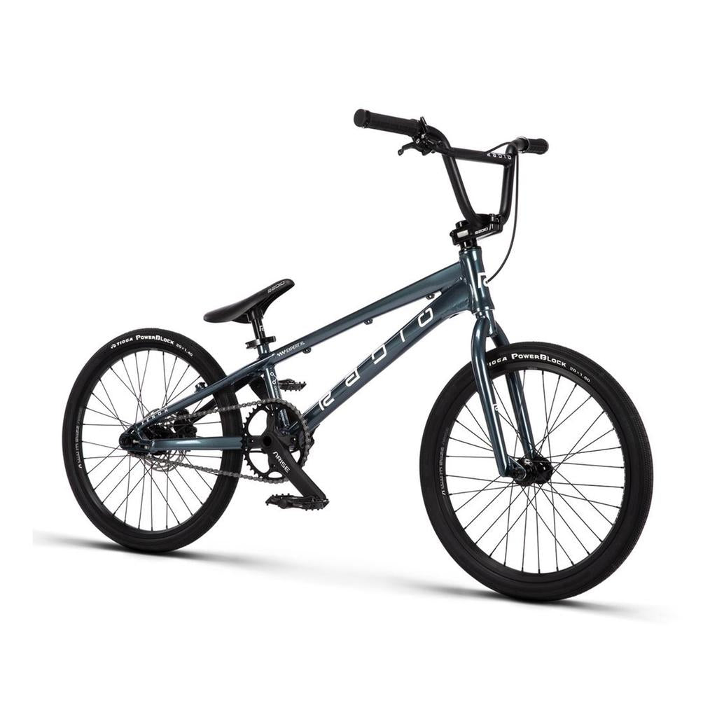 The Radio Xenon Expert XL Disc 20 Inch Bike features a dark blue, lightweight alloy frame, front and rear black wheels, and raised handlebars on a white background—ideal for riders seeking a stylish and high-performance race BMX bike.