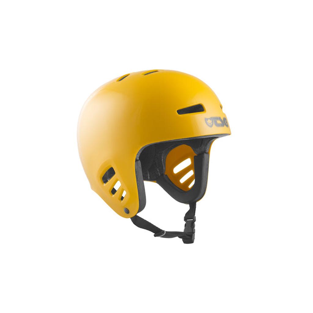 The TSG Dawn Full Cut Helmet in mustard features hardshell construction, black padding, ventilation holes, ear coverage, and an adjustable chin strap, shown on a white background.