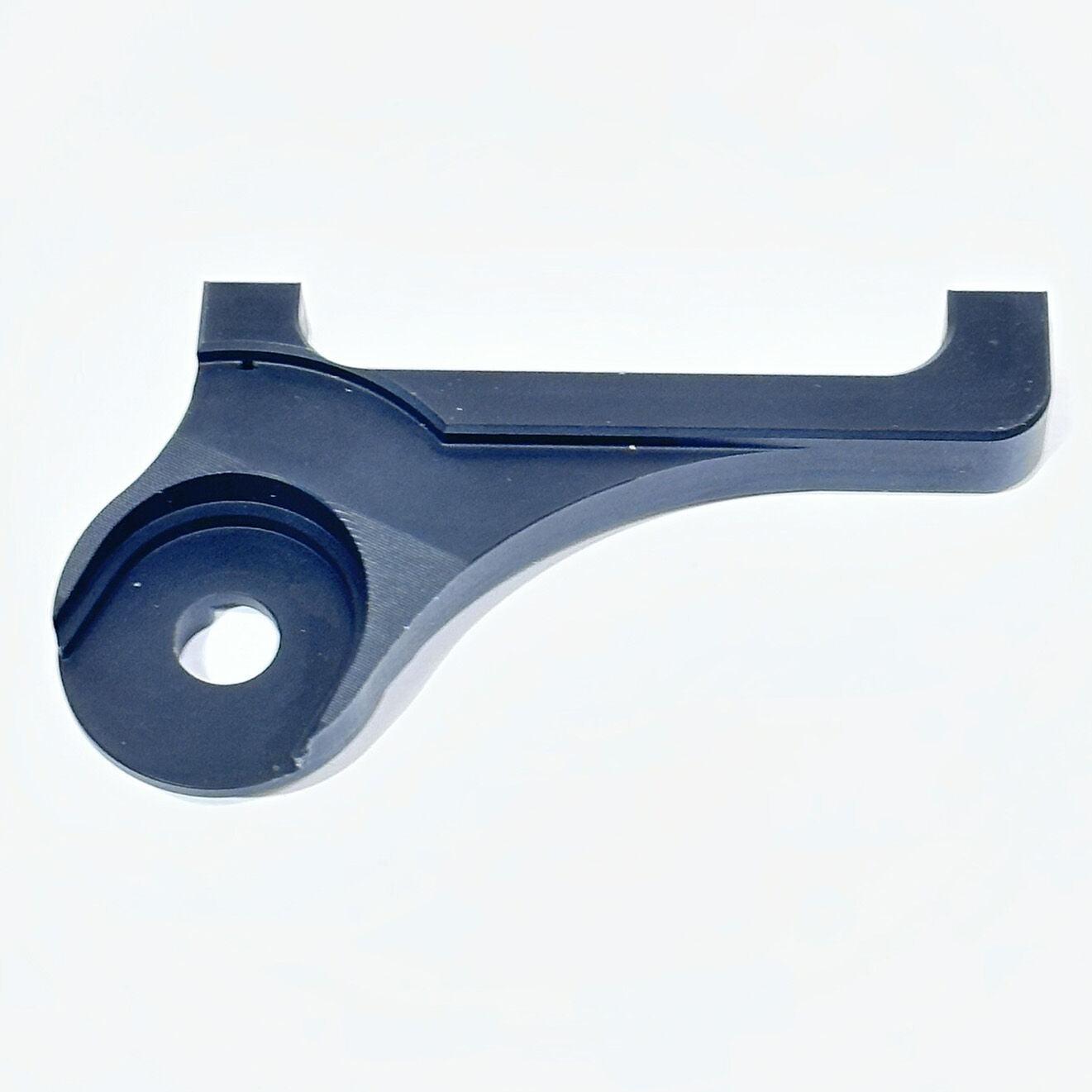 The Calculated VSR Disc Brake Mount 10mm (120mm rotor) is a black CNC-machined metal bracket with a round hole and U-shaped slot, perfect for adapting 10mm axles or 120mm disc brakes—pictured against a white background.