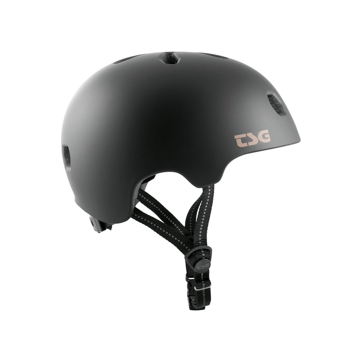 The TSG Meta Helmet Satin Black features ventilation holes, lightweight in-mold construction, and an adjustable chin strap, shown from the left side.
