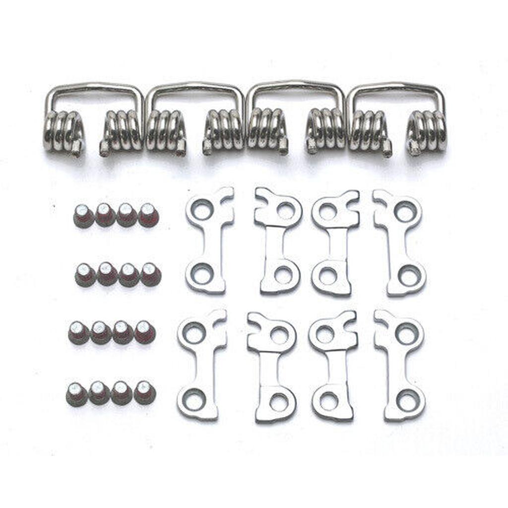 HT Components - SX Pedal Upgrade Kit-T2, X3 includes metal coil springs, red-tipped cylindrical components, and flat metal brackets—great for BMX upgrades. All items are neatly arranged on a white background.