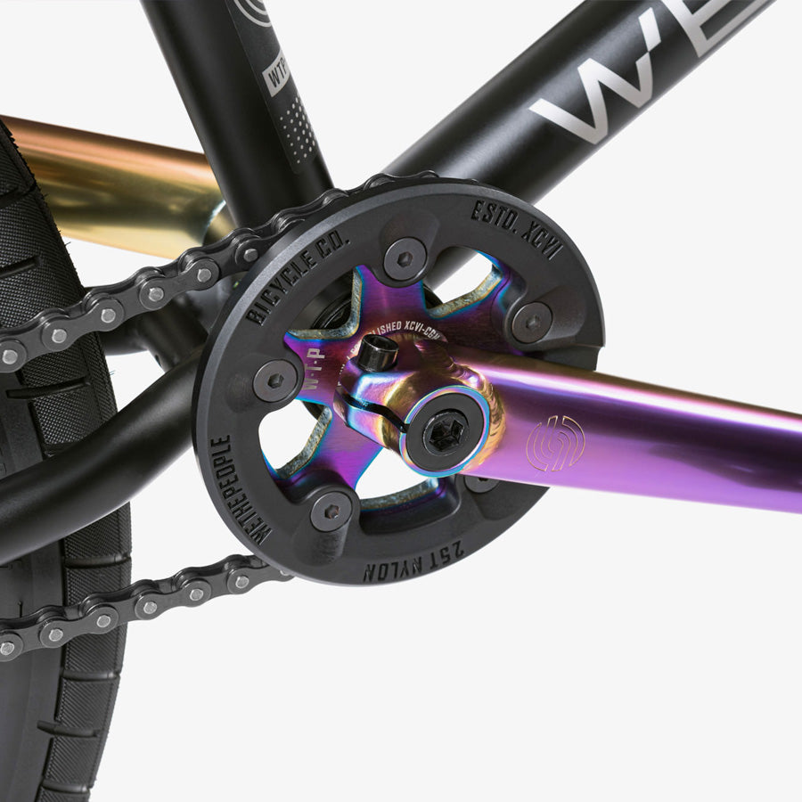 A high-performance Wethepeople Reason 20 Inch BMX bike, showcasing a rainbow chain.