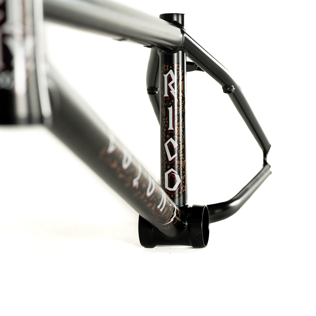 A black bike frame with the word rio on it, designed by Colony Rico 'Lite' Frame.