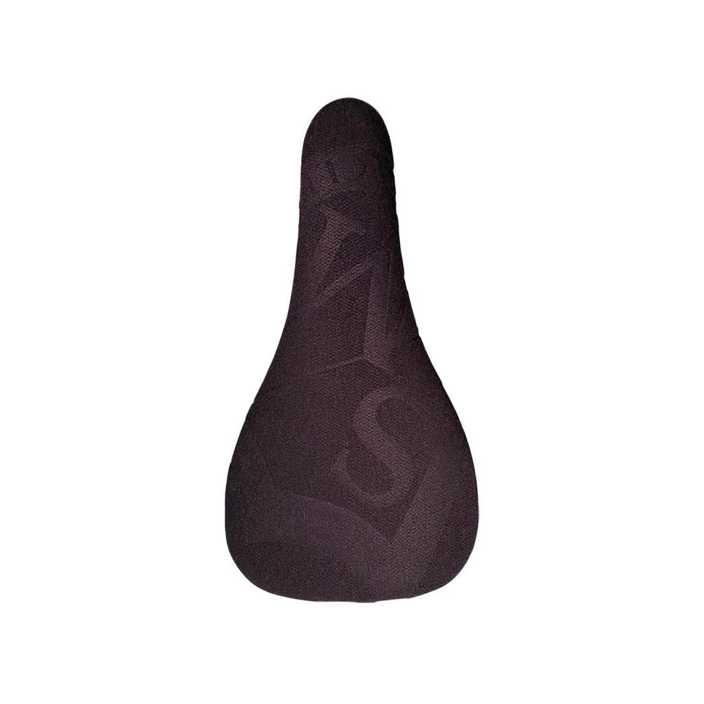 The S&M Shield Kevlar Railed Seat, shown from above on a white background, features a black textured kevlar cover with subtle embossed letters and cro-mo rails.