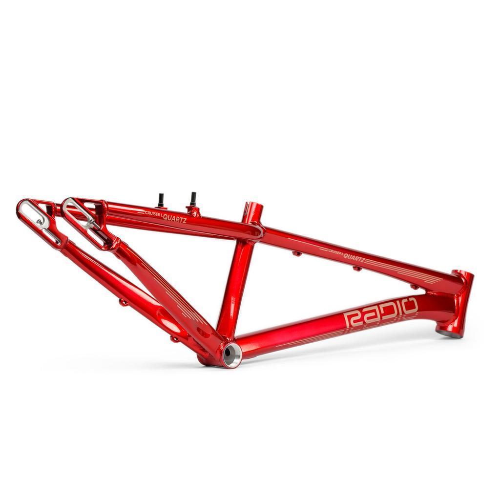 The Radio Raceline Quartz 2025 Pro XL Cruiser Frame, a red aluminium BMX race frame with a sliding dropout disc system, is shown isolated on a white background.