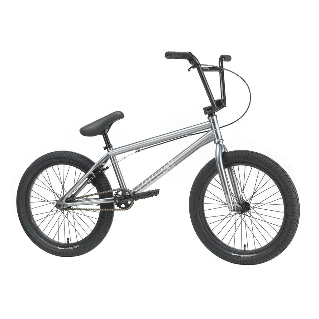 The Sunday Scout 20 Inch Bike—a silver BMX featuring black handlebars, seat, and tires with premium Odyssey components—is displayed against a white background.