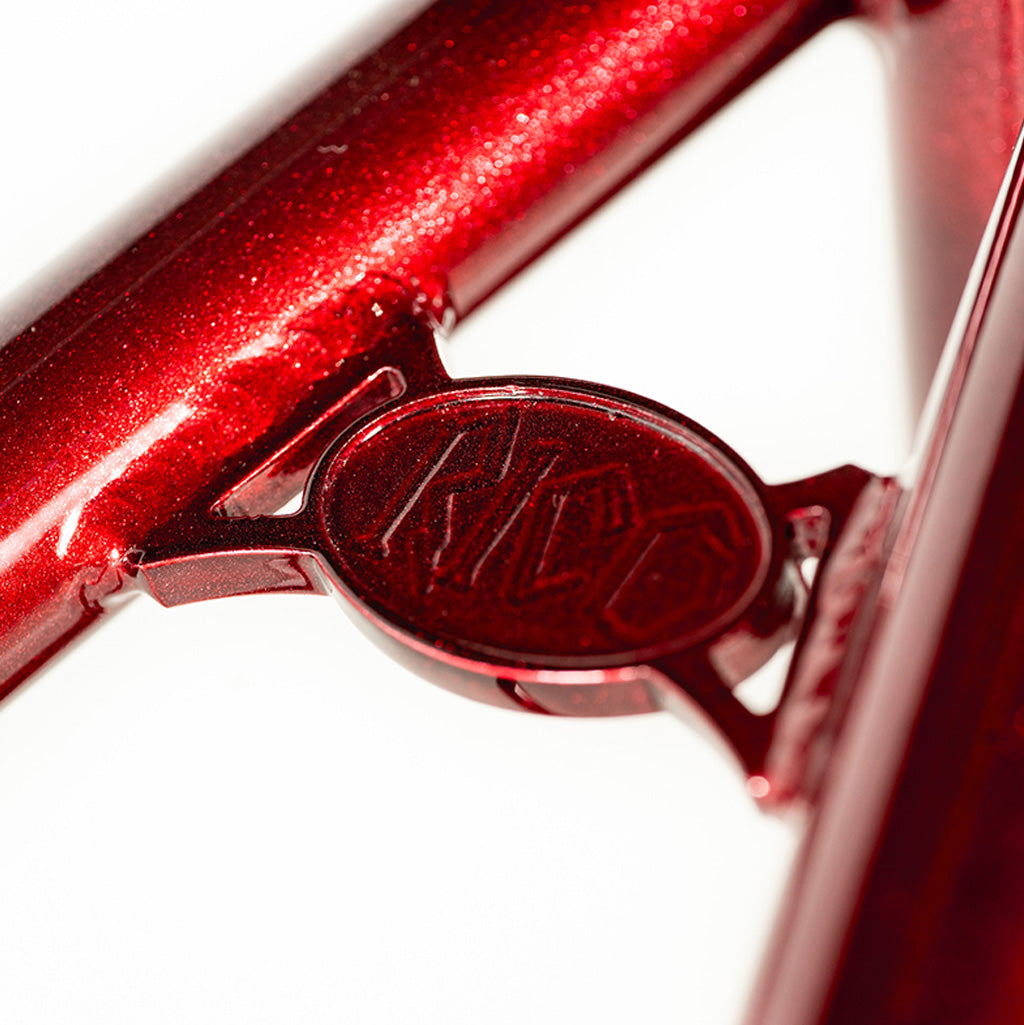 A close up of a red Colony Rico 'Lite' bicycle frame.