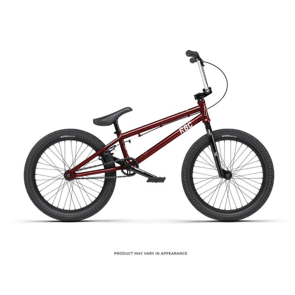 The Radio Saiko 20 Inch Bike is a maroon kids BMX with black handlebars, seat, pedals, and wheels. Shown side view on white background, it features durable Chromoly three-piece cranks inspired by the original Radio Saiko 20 bike.