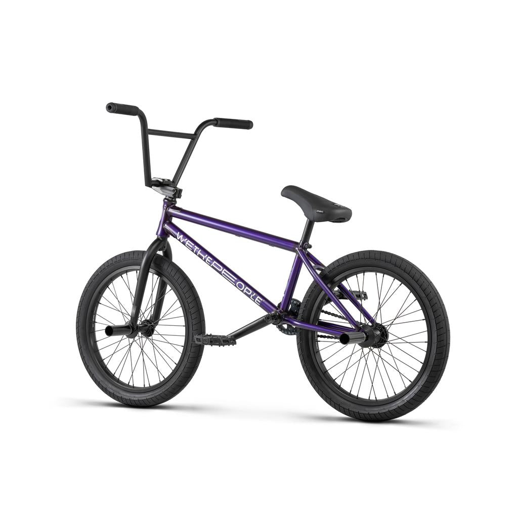 The Wethepeople Reason Shift 20 Inch Bike is a premium BMX with a full chromoly frame, shown in purple with black handlebars, seat, and tires on a white background.