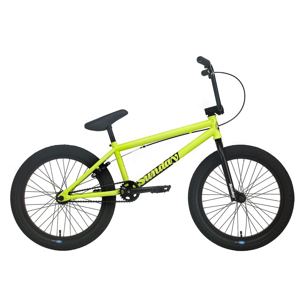 The Sunday Blueprint 20 inch Bike is displayed from the side on a white background, showcasing its yellow frame paired with black wheels, seat, and handlebars. Designed with pro-level geometry for optimal performance, this beginner BMX bike perfectly illustrates Sunday’s signature style.