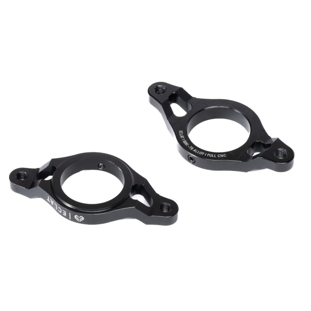 The Eclat Rise Gyro Rotor Plate is made from lightweight 6061-T6 black anodized aluminum, with circular openings and three screw holes per bracket, displayed on a white background.