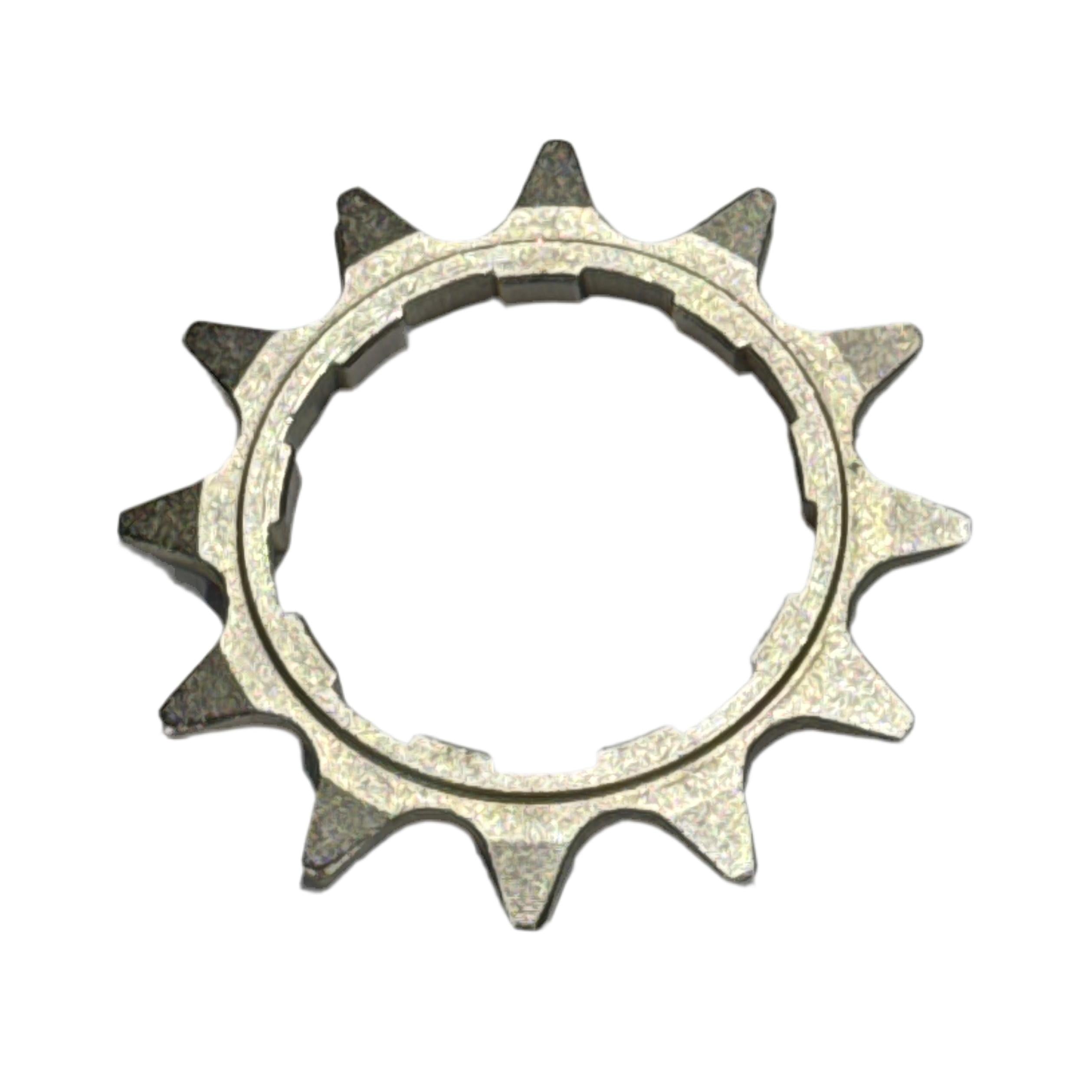 The CNC 1/2x1/8 HG Cassette Cog—a metallic, heat-treated chromoly 12-tooth cog compatible with 1/2x1/8 chains—is shown on a white background.